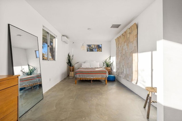 interior space featuring concrete floors and a wall unit AC