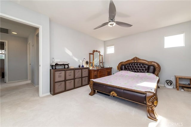 carpeted bedroom with ceiling fan