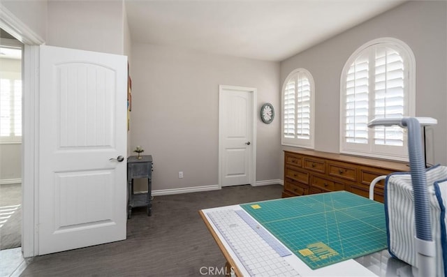 bedroom featuring dark colored carpet