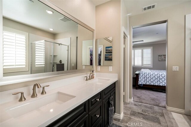 bathroom with vanity and walk in shower