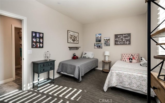 bedroom featuring multiple windows