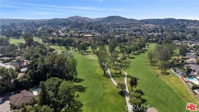 drone / aerial view featuring a mountain view