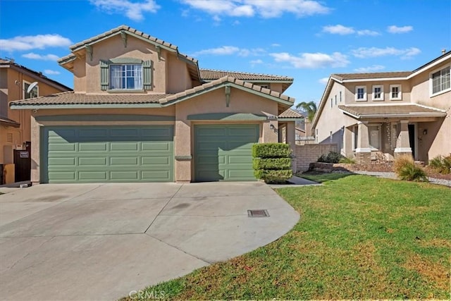 view of front of home with a front lawn and a garage