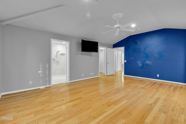 interior space with light wood-type flooring, ceiling fan, and lofted ceiling