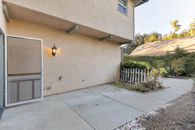 view of home's exterior featuring a patio