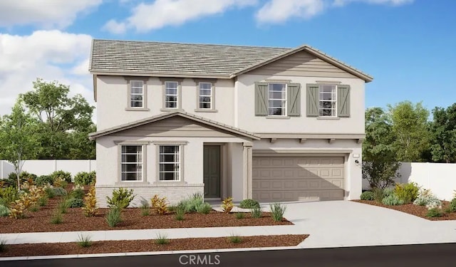 view of front of home with a garage