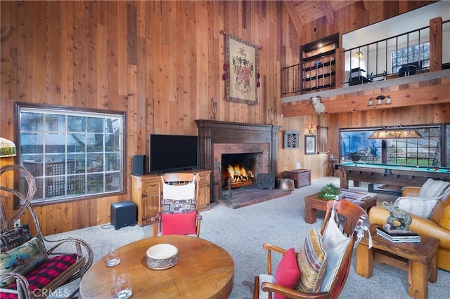 living room with plenty of natural light, carpet, and billiards