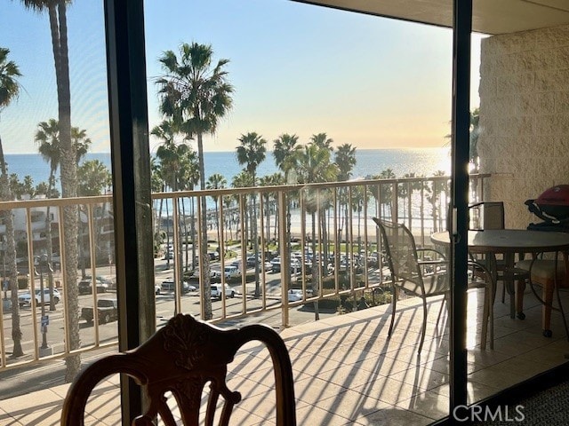 balcony at dusk with a water view