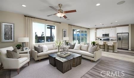 living room with ceiling fan