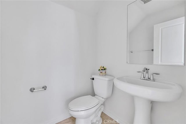 bathroom with toilet and sink