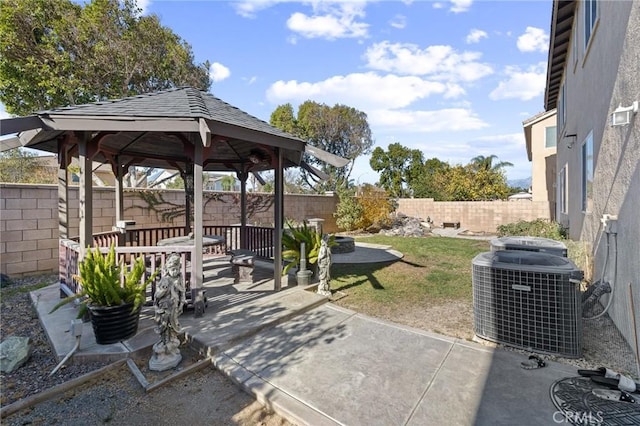 view of patio featuring a gazebo and cooling unit