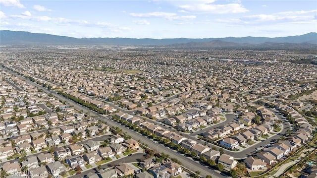 drone / aerial view featuring a mountain view