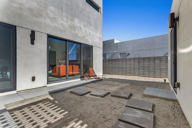 view of patio with fence