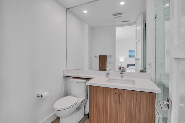 full bath featuring toilet, visible vents, ensuite bath, and vanity