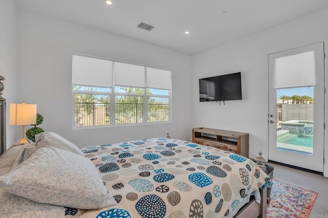 bedroom featuring recessed lighting, visible vents, and access to exterior