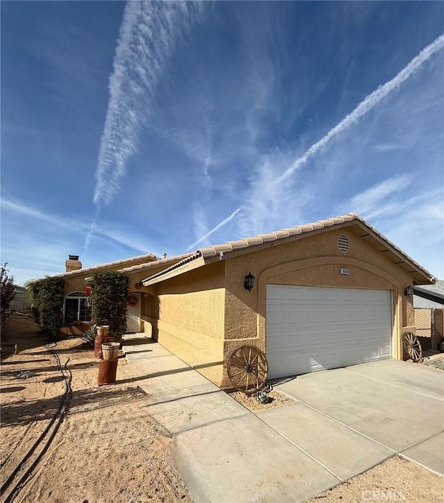 view of front of home with a garage