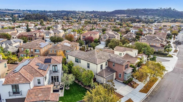 drone / aerial view featuring a mountain view