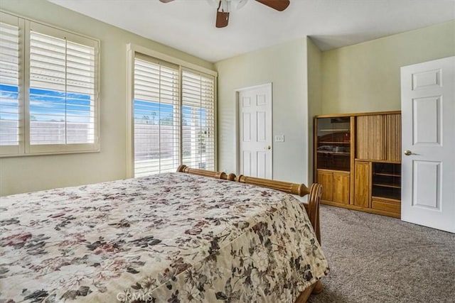 bedroom featuring carpet and ceiling fan