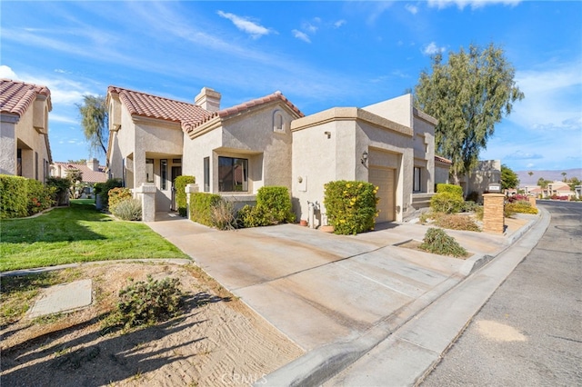 mediterranean / spanish-style house with a tiled roof, a garage, a chimney, concrete driveway, and stucco siding