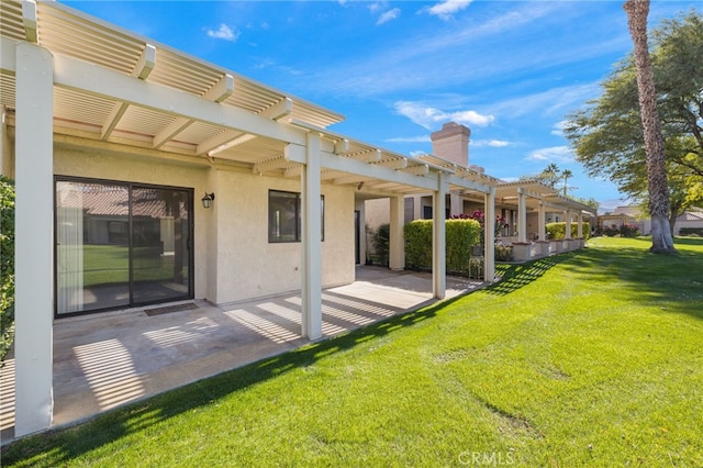 view of yard with a patio area and a pergola