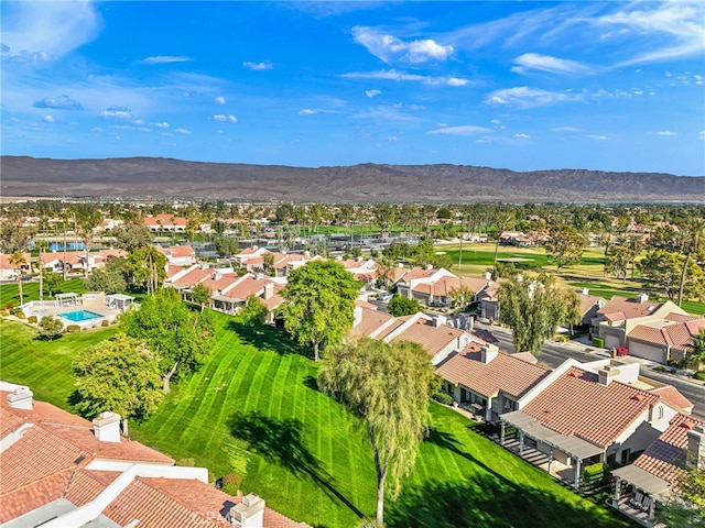 drone / aerial view featuring a mountain view