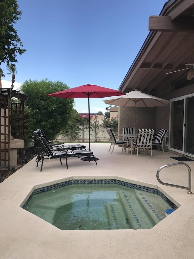 view of swimming pool with a pergola and a patio area