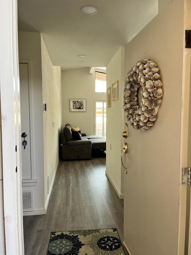 hall with dark hardwood / wood-style floors