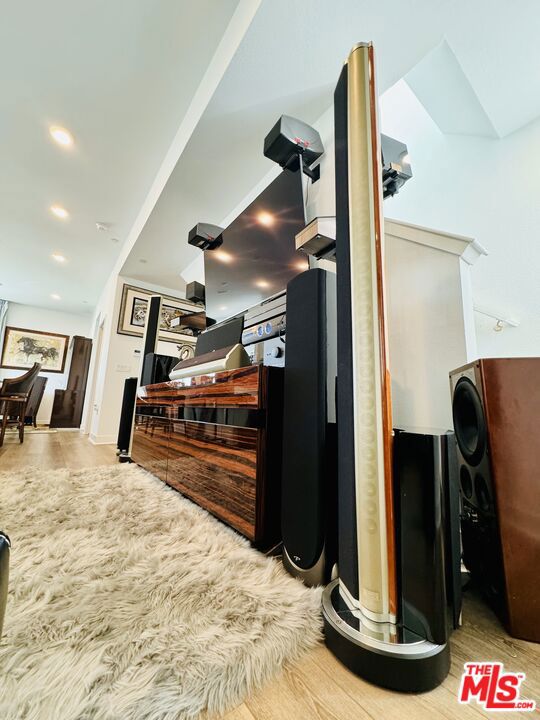 corridor featuring hardwood / wood-style flooring