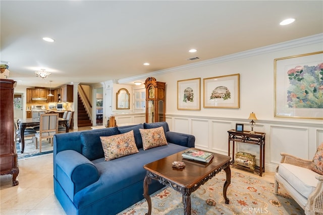 tiled living room with ornamental molding