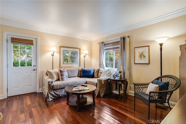 living room with dark wood-type flooring and ornamental molding