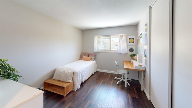 bedroom featuring dark hardwood / wood-style floors