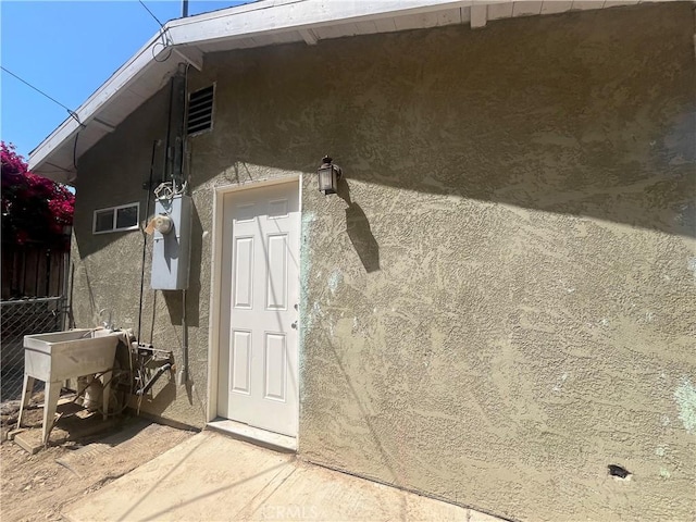 4419 Radium Dr, Los Angeles, CA 90032 - view of exterior entry featuring stucco siding
