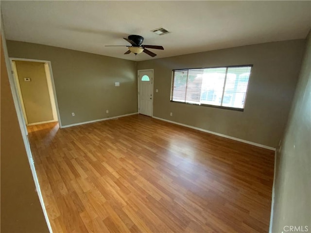 interior space featuring ceiling fan and light wood-type flooring