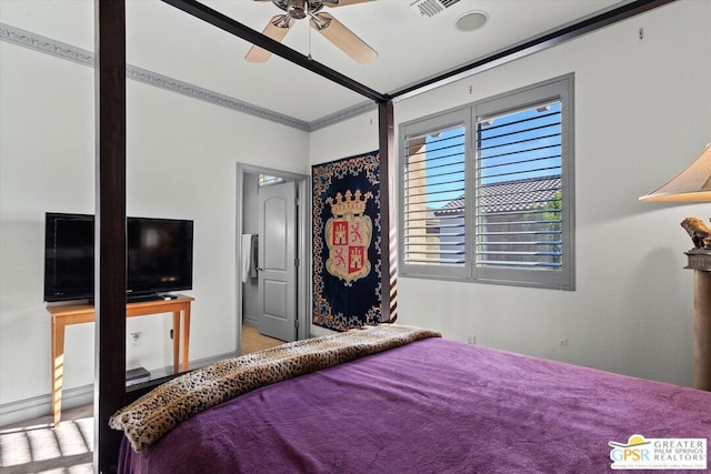 bedroom with ceiling fan and crown molding