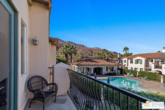 balcony featuring a mountain view