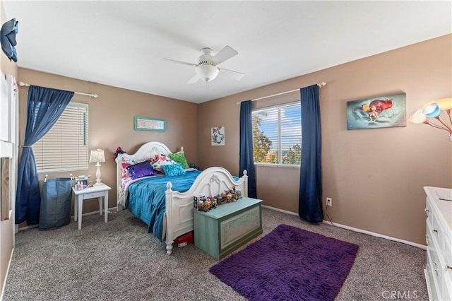 bedroom featuring ceiling fan, carpet, and baseboards