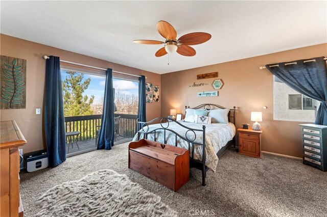 carpeted bedroom featuring baseboards, access to outside, and ceiling fan