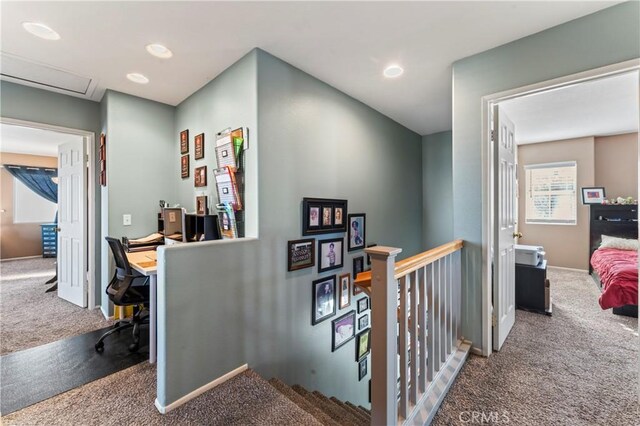hallway with recessed lighting, an upstairs landing, carpet flooring, and baseboards