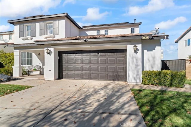 traditional-style house with concrete driveway, stucco siding, and roof mounted solar panels