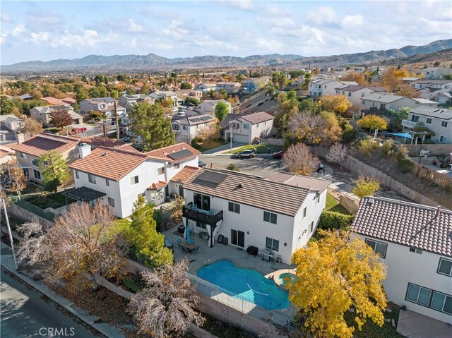 bird's eye view featuring a mountain view and a residential view