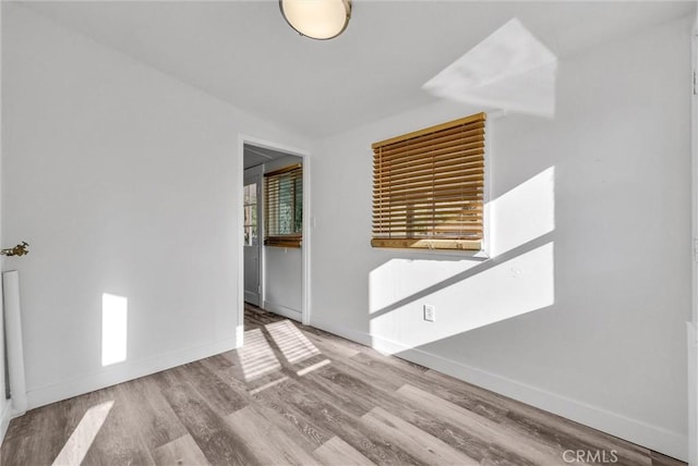 empty room featuring light wood-type flooring