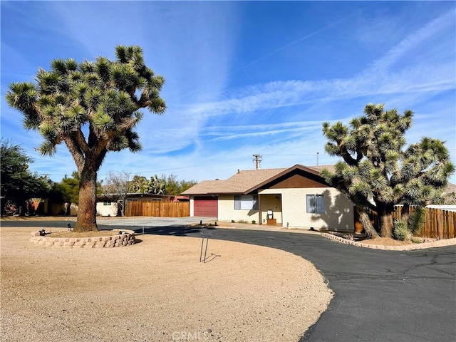 view of front of property featuring a garage