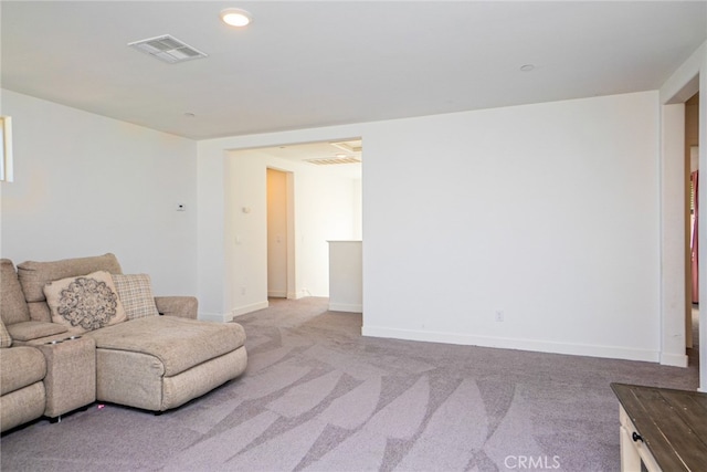 living room featuring light colored carpet