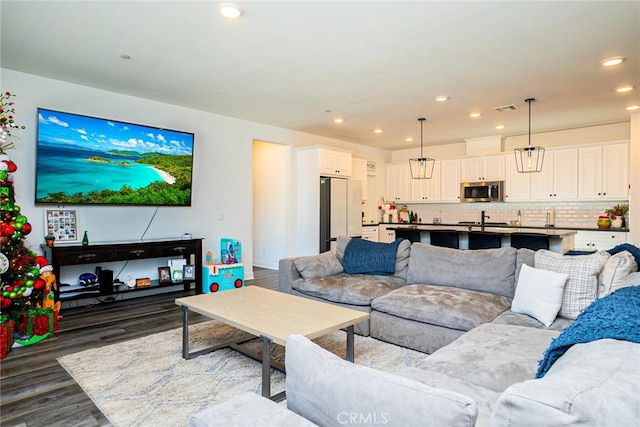 living room featuring dark hardwood / wood-style flooring