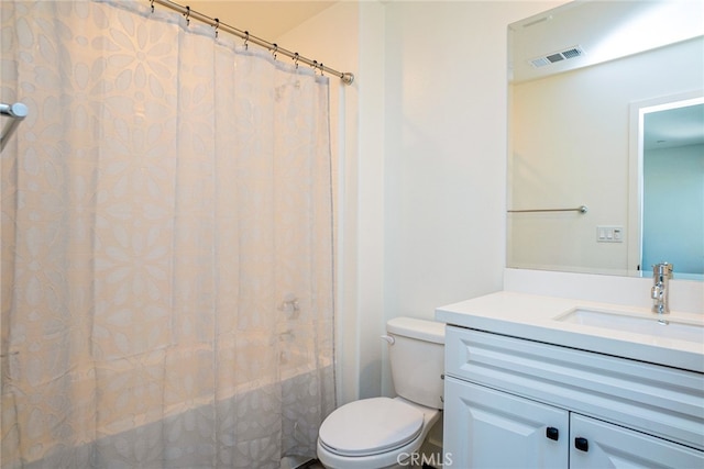 full bathroom featuring vanity, toilet, and shower / bath combo