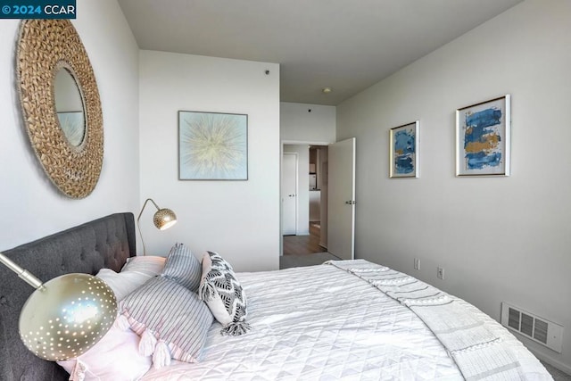 bedroom featuring wood-type flooring