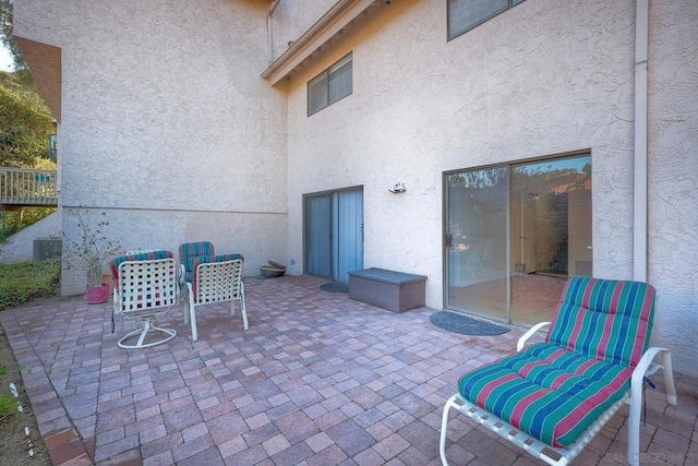 view of patio featuring central AC