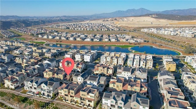 aerial view with a water and mountain view