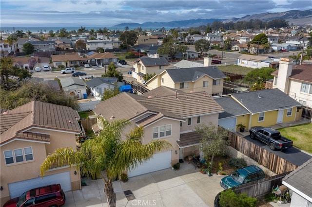 drone / aerial view featuring a mountain view