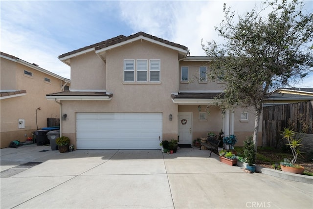 front of property with a garage